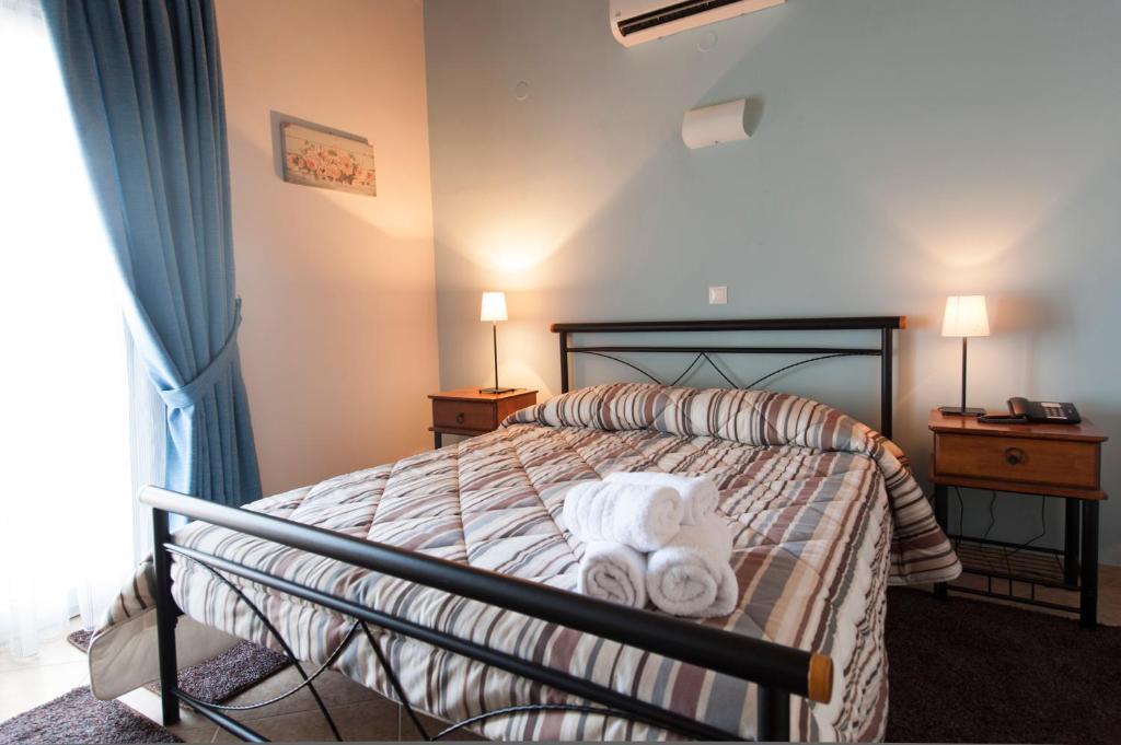 Iliothea Hotel Náuplia Quarto foto